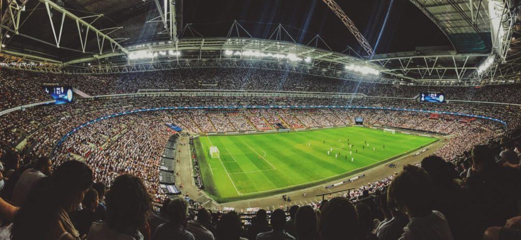 photo of wembley stadium taken from the crowd